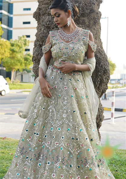 Jade green lehenga set with heavy mirror work